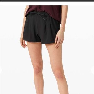 Black Lululemon Stroll at Sundown Mid-Rise Shorts. Size 10.